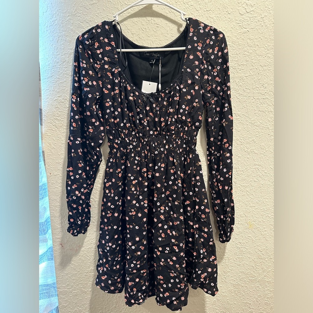 XS floral dress. It’s an Oak and trellis dress